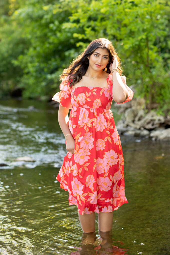 Senior pictures at Nichols Arboretum in Ann Arbor, showcasing nature, gardens, and tranquil bench settings